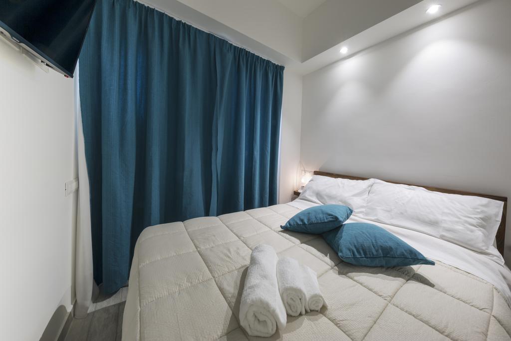 Piazza Martiri Rooms Кальяри Номер фото