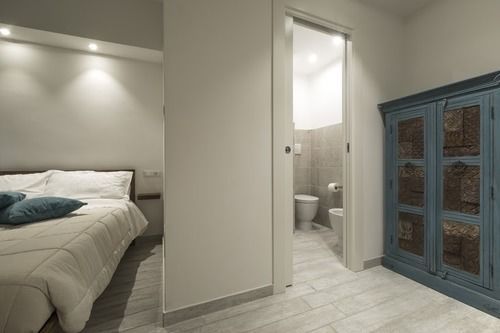 Piazza Martiri Rooms Кальяри Экстерьер фото